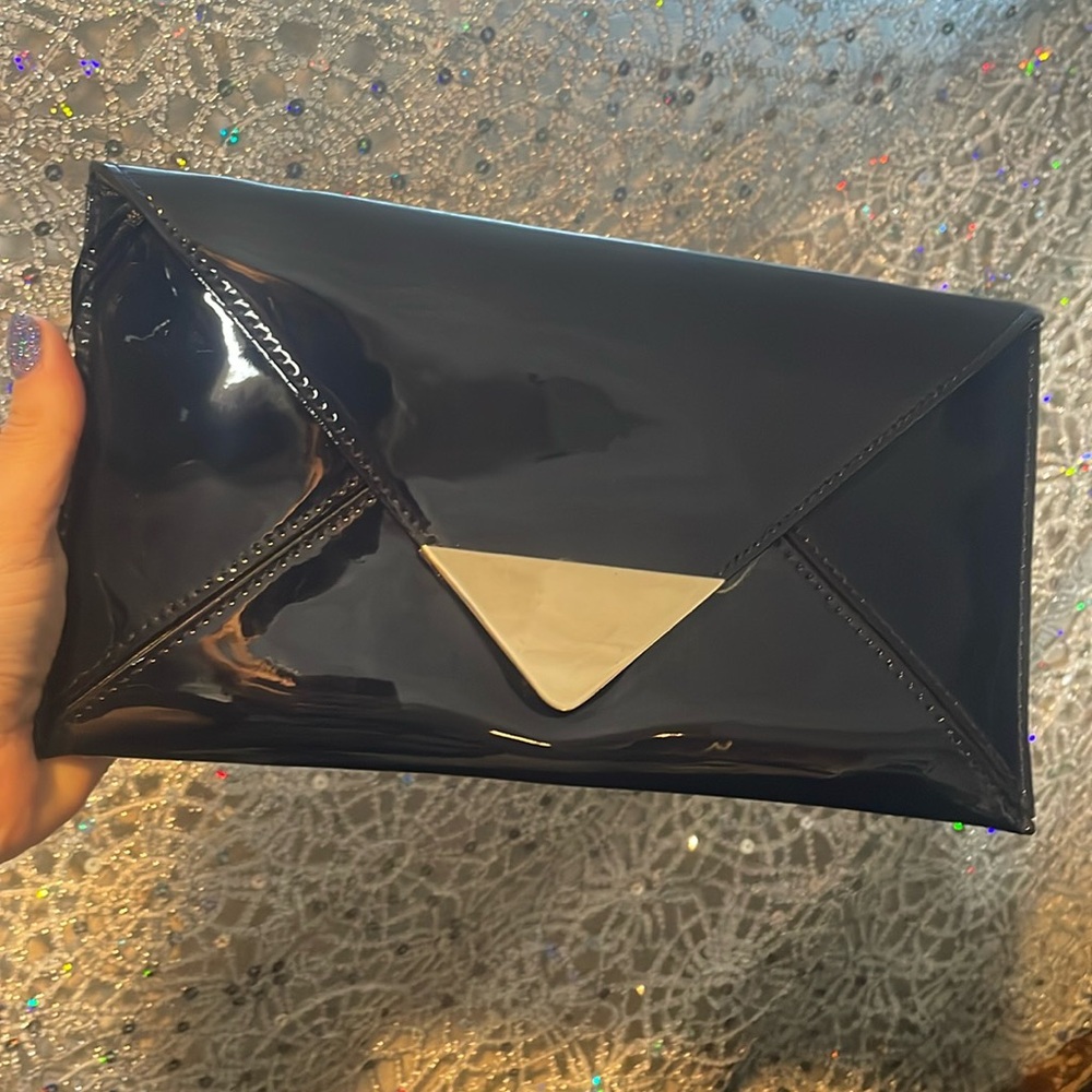 Patent leather clutch with strap